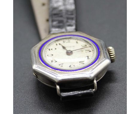 A lady's vintage Rolex silver cased wristwatch, having octagonal case with silvered white enamel Arabic dial within a blue en