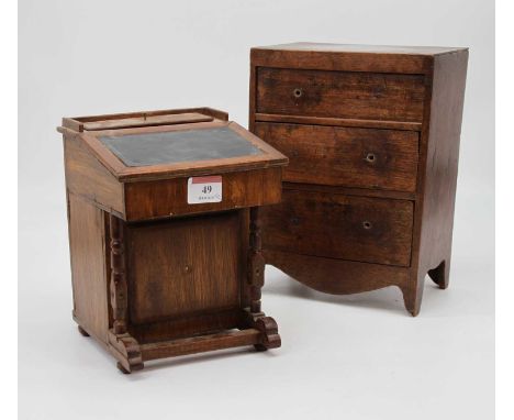 A 19th century mahogany apprentice chest, containing three graduated drawers, on bracket feet, w.19cm; together with an appre