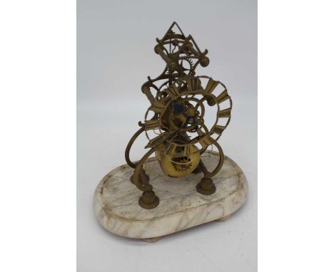 A 19th century brass skeleton clock, the chapter ring showing Roman numerals, having a single fusee movement and anchor escap