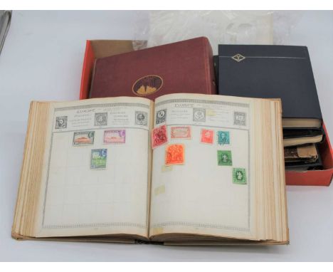 A collection of vintage world stamp albums and contents