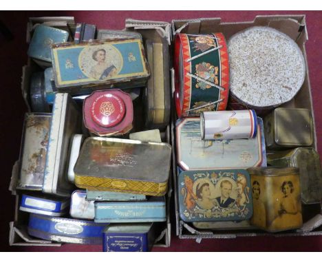 Two boxes containing vintage advertising tins