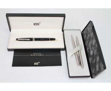 A Mont Blanc ball point pen, boxed with service guide, together with two Parker pens, boxedThere are light signs of use and s