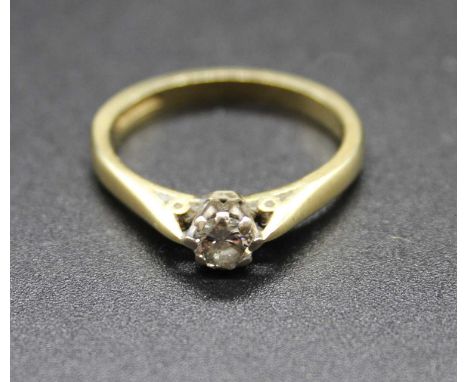 An 18ct gold diamond solitaire ring, the claw set round brilliant having a stated weight of 0.27 carats, 3.4g, size M