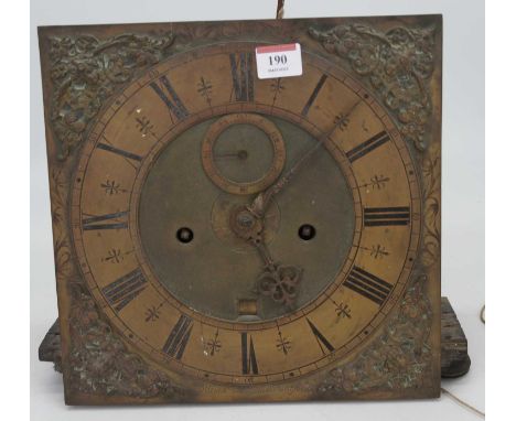 An 18th century brass long case clock dial and movement, the brass chapter ring showing Roman numerals with subsidiary second
