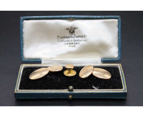 A pair of gent's 9ct gold cufflinks, each engraved with Rotary International emblem; together with a single 9ct gold collar s