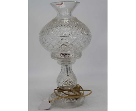 A crystal glass table lamp, having diamond cut decoration, height 36cm