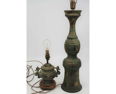 A Chinese verdigris metal table lamp of archaic form, height 81cm, together with another smaller