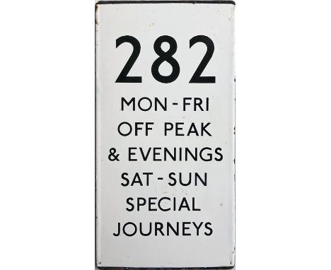 London Transport bus stop enamel E-PLATE for route 282. A double-vertical example that is lettered 'Mon-Fri Off Peak &amp; Ev