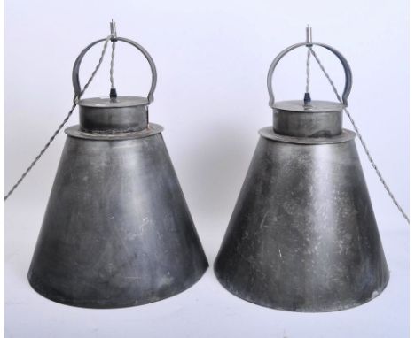 A pair of retro 20th century circa 1970s galvanised metal conical industrial ceiling lights shades. Each light having a metal