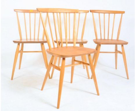 Ercol - Model 449 - A set of four vintage 20th century beech and elm stick back dining chairs by Ercol known as the Fan Back 