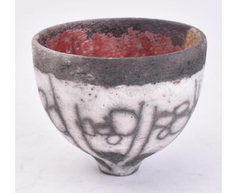 Manner of Robin Welch - A 20th century Japanese Volcanic glaze studio pottery bowl. The stoneware body decorated with scrolle