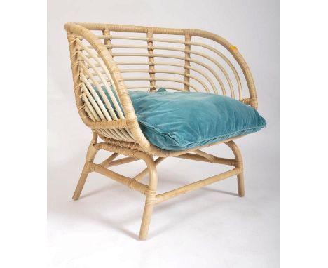 IKEA - Model Buskbo - A vintage late 20th century wicker rattan bamboo Buskbo armchair / easy lounge chair. The armchair havi