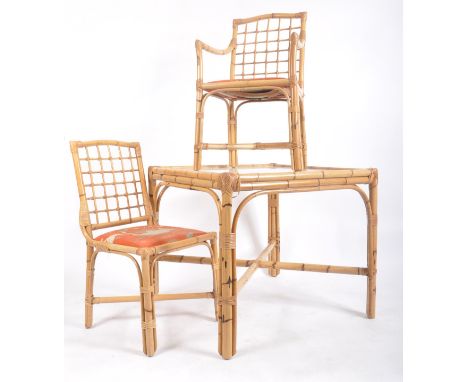 A vintage 20th century bamboo dining / kitchen table and two chairs. The table of square from with inset clear glass top rais