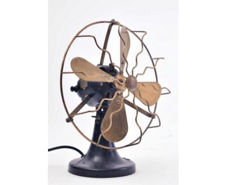 A vintage 20th century circa 1930s brass &amp; cast iron EMI desk fan. The fan having a brass fan &amp; head over a cast iron