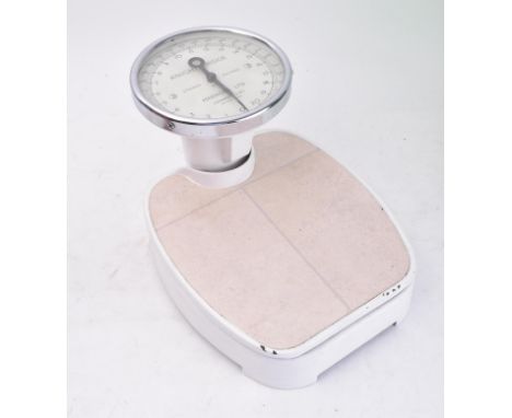Harrods - A vintage mid 20th century set of scales. The scales having glass dialled top with chrome frame&nbsp;inscribed The 