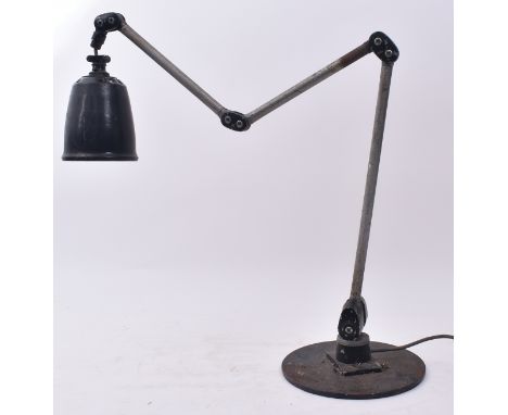A retro mid 20th century British workman's industrial anglepoise desk lamp light. The lamp having a black pendant shade suppo