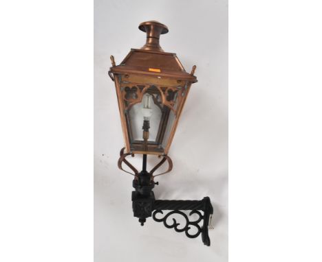 A late 20th century Gothic style external copper and cast iron wall lamp light. The light in a Victorian style, with Gothic f