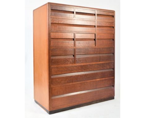 Betty Joel for Token Works - A 20th century 1930s Art Deco pollard oak chest of drawers. The chest having an asymmetrical arr