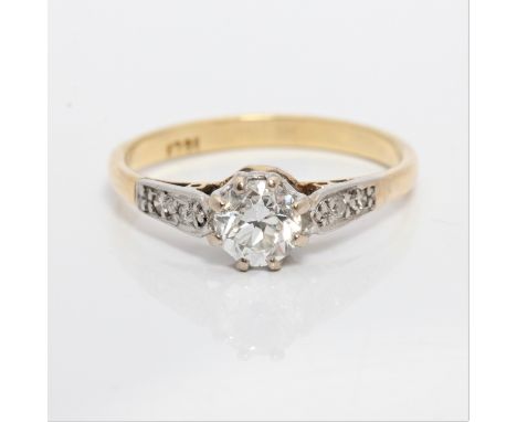 A diamond ring, set with a principal transitional cut diamond, measuring approx. 0.50ct, flanked to either side by two diamon