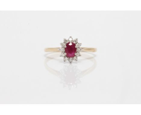 A hallmarked 9ct yellow gold ruby and diamond cluster ring, ring size Q1/2, approx. weight 1.9g. IMPORTANT: Viewing available