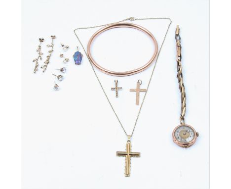 A bangle, cross pendants, stud earrings, ladies wristwatch on bracelet strap, some stamped 9ct, some items A/F.