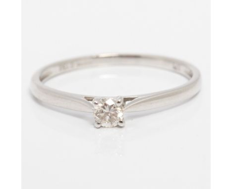 A hallmarked 9ct white gold diamond solitaire ring, set with a round brilliant cut diamond measuring approx. 0.15ct, ring siz