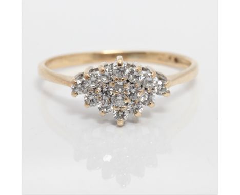 A hallmarked 9ct yellow gold cubic zirconia cluster ring, ring size L 1/2