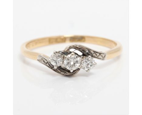 A diamond three stone ring, set with three graduated round brilliant cut diamonds, total diamond weight approx. 0.20ct, stamp