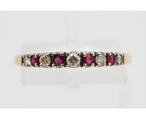 A hallmarked 9ct yellow gold ruby and diamond half eternity ring, ring size Q1/2, approx. weight 1.4g.