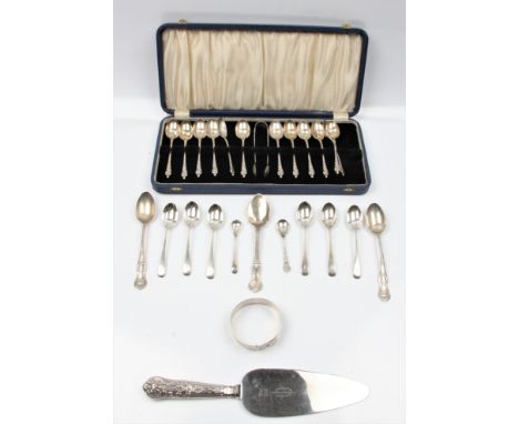 A boxed set of twelve hallmarked silver apostle spoons and a pair of sugar tongs, together with a set of six hallmarked silve