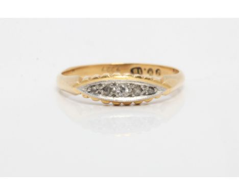 A five stone diamond ring, stamped 18, ring size P.