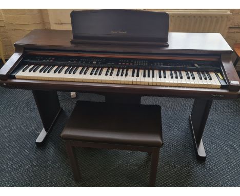 A Technics 'Digital Ensemble' electric piano with stool, model number PR350