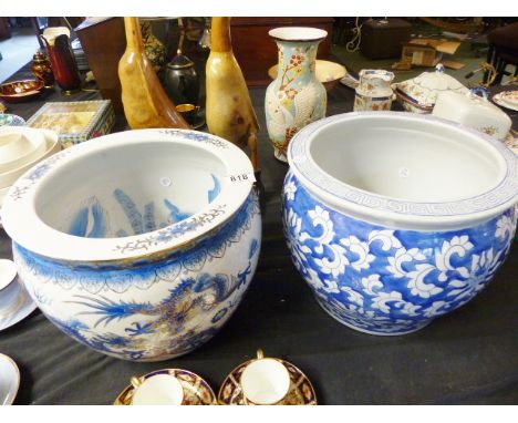 JAPANESE CERAMIC POTS. Two Japanese blue ceramic pots