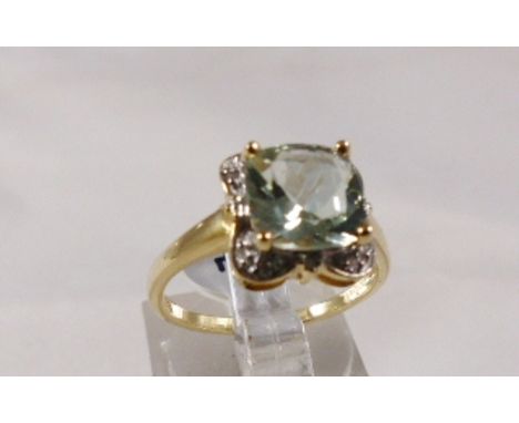 9CT DIAMOND RING. 9ct gold green cushion shaped and diamond set ring, size N