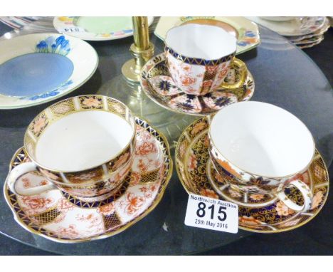 ROYAL CROWN DERBY. Three Royal Crown Derby cups and saucers