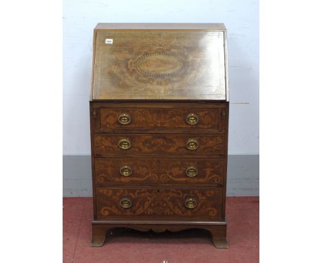 An Edwardian Inlaid Mahogany Bureau, the fall front with shell and ribbon marquetry inlay, four graduated drawers similarly i