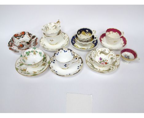 A Rockingham Porcelain Trio, decorated with fruiting vines in yellow, dark blue and gilt, with a moulded ground, six other Ro