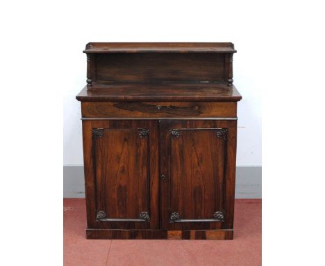 A XIX Century Rosewood Chiffonier, the upper shelf with three-quarter gallery and turned supports, the base with a single dra