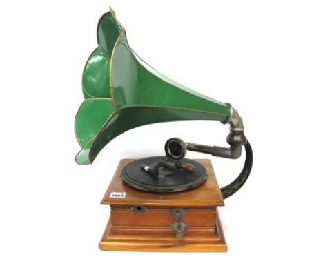 An Early XX Century Table Top Gramophone, with green trumpet horn, stepped square base, winder present.