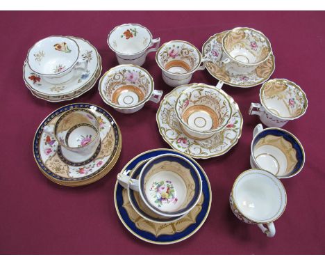 A Quantity of Rockingham and Other Porcelain Trio's, Tea Cups and Saucers, of floral and scrolling designs, some with puce Gr