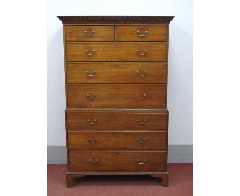 A Late XVIII Century Oak Chest on Chest, the top with dentil cornice and two short and three long drawers, above three drawer