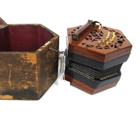 A Lachenal and Co Concertina, with twenty-one bone buttons on pierced mahogany ends, five fold bellows, serial number 119958,