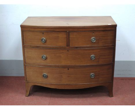 An Early XIX Century Mahogany Bow Fronted Chest of Drawers, with two short and three long drawers, on bracket feet, 88cm high