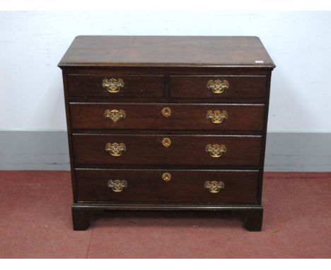 A Late XIX Century Oak Chest of Drawers, the moulded top over two short and three long drawers on bracket feet, 82cm high, 89