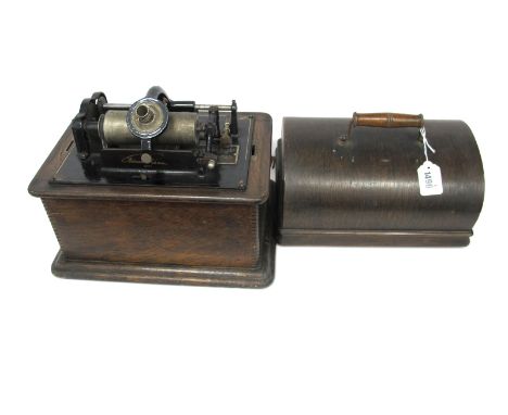 A Thomas Edison Standard Phonograph, with black and silvered label, number 416481, chromes cylinder and winding crank, on a w