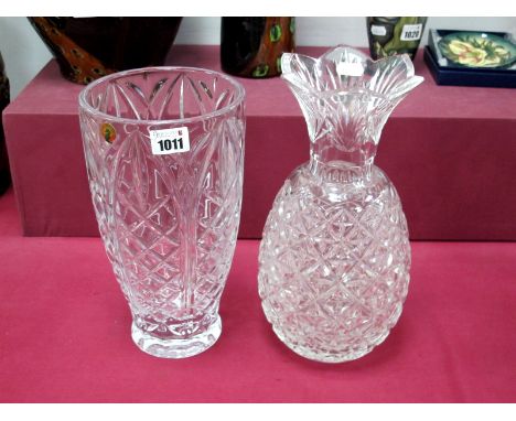 A Waterford Crystal Vase, modelled as a pineapple, etched mark and label, 30.5cm high; A Waterford Tapered Vase, 28cm high. (