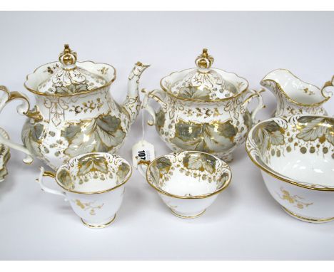 A Rockingham Porcelain Part Tea Service, decorated in pattern number 1224 with flowering foliage in shades of grey and gilt, 