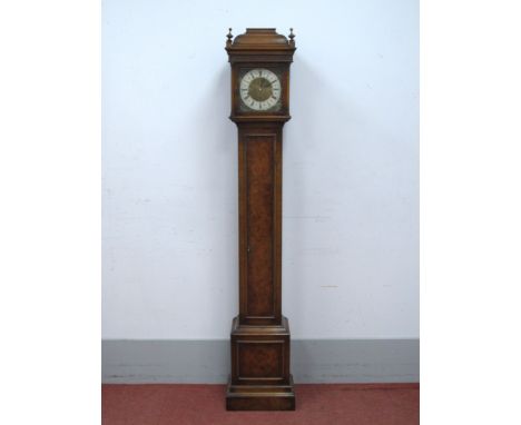 A Mid XX Century Walnut Grandmother Clock, by "Elliott, London", with silvered dial and Roman numerals, the hood with a caddy