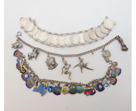 A white metal bracelet made from mid century Venezuelan 25 Centimos coins, a silver and enamel place name charm bracelet and 