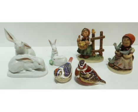 A Herend model of rabbits, no 5332, another smaller, two Hummel figures, and two Royal Crown Derby bird paperweights Conditio